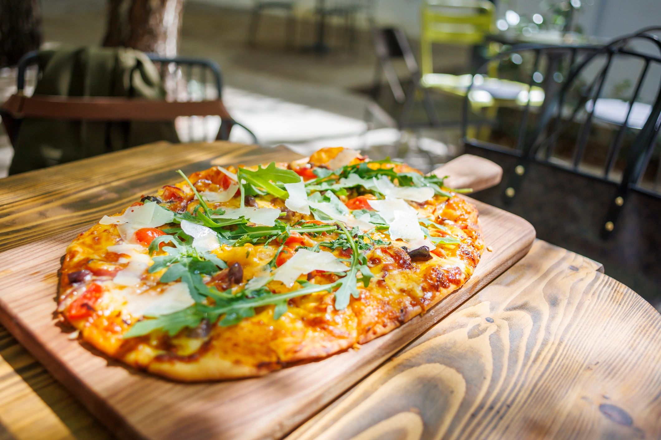 Freshly baked pizza topped with vegetables